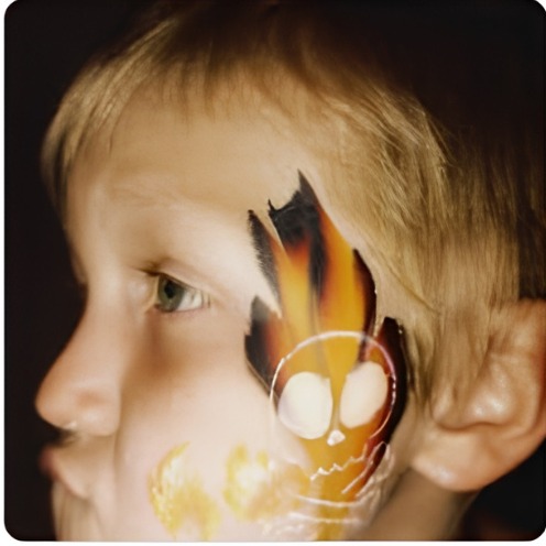 Fire and flame skull face paint design