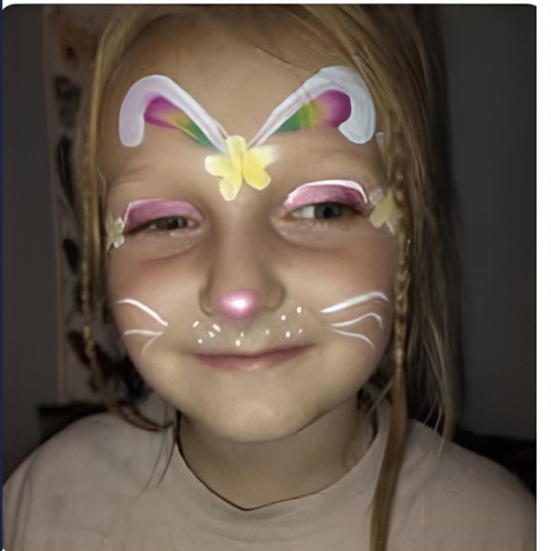 Bunny face paint design with nose and whiskers