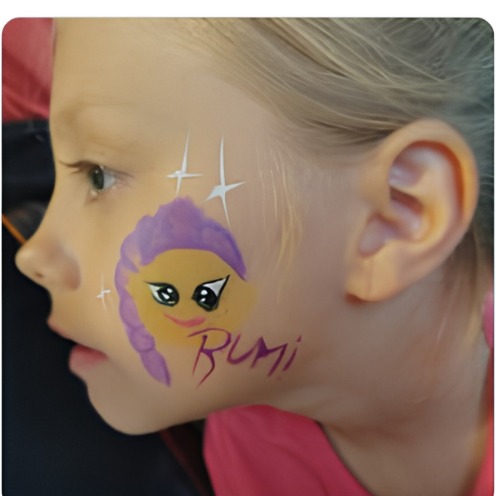 Purple and yellow fairy face paint design