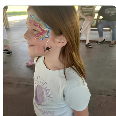 Rainbow dragon eye face paint design