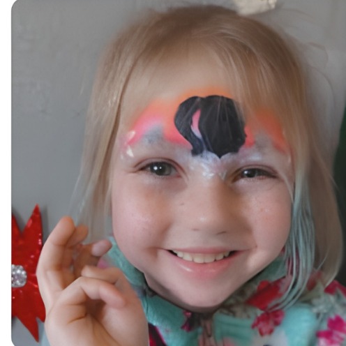 Orange and black crown face paint design