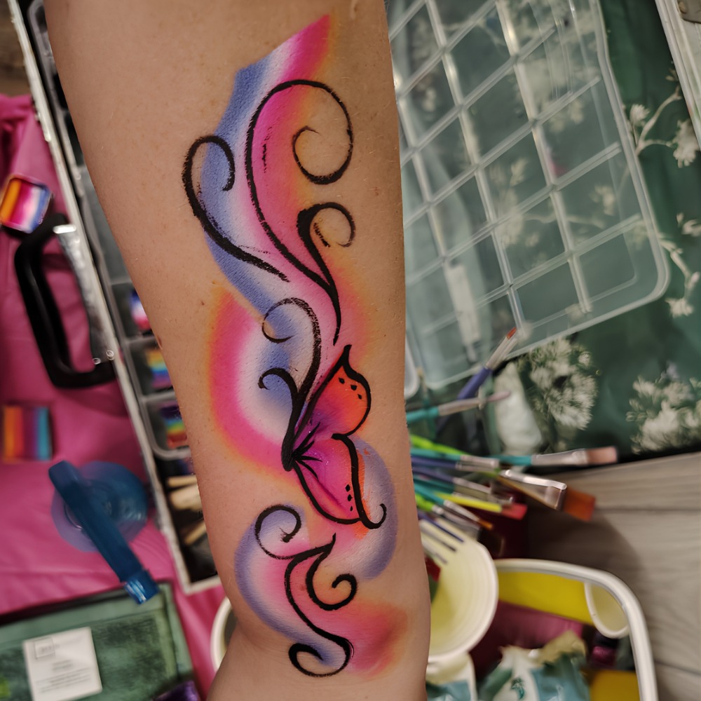 Colorful butterfly swirl arm design